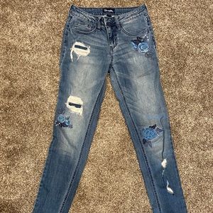 Wrangler skinny jeans with blue roses embroidered